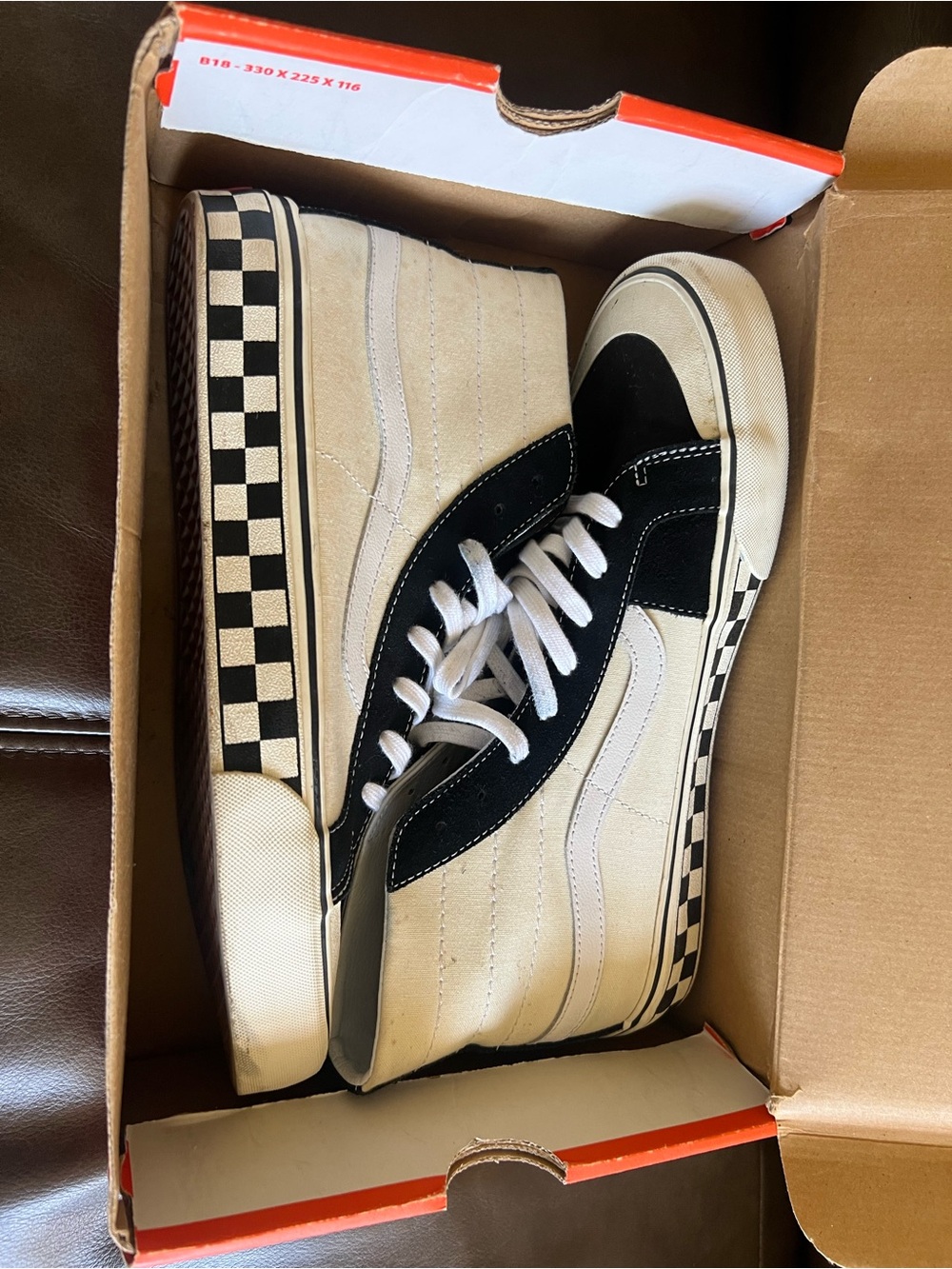Vans Black & White Checkerboard High-Top Sneakers